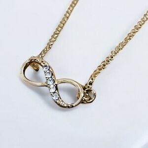 NEW Gold Tone Rhinestone Infinity Necklace